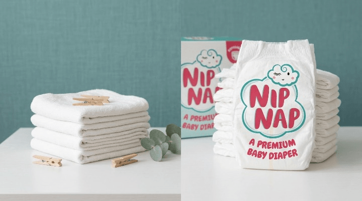 Cloth nappies and disposable nappies side by side on a table